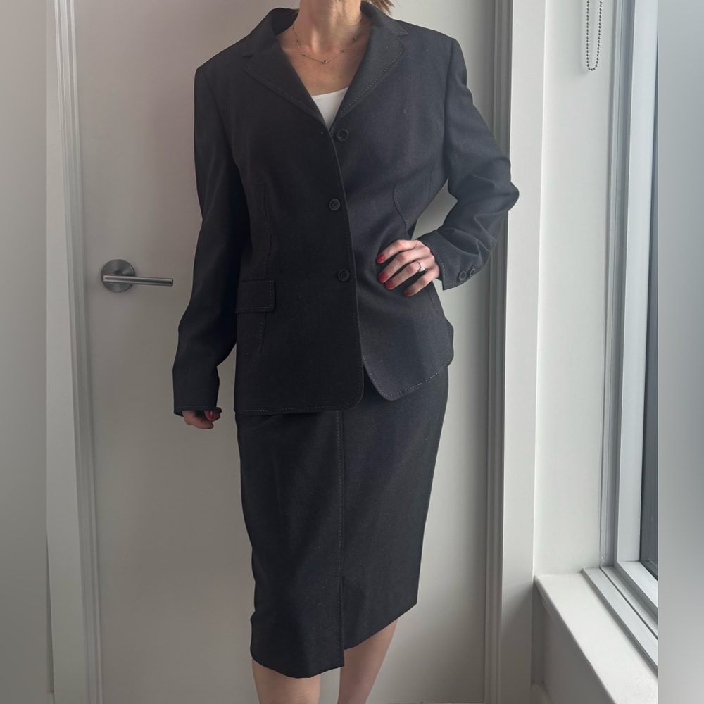 Louis Féraud Black Jacket with Red Accent Nails Visible